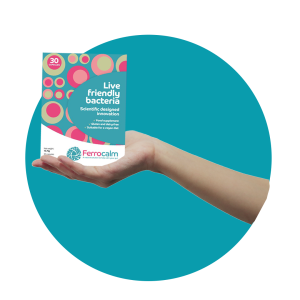 Ferryx - Ferrocalm package design, hand holding package with turquoise background