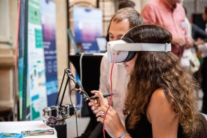 Attendee taking part in a demo at the Senmag Robotics stand