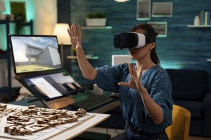 Amutri 3D visualisation in use - woman using VR headset for architectural design