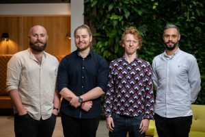 Four members of Light Trace Photonics' team