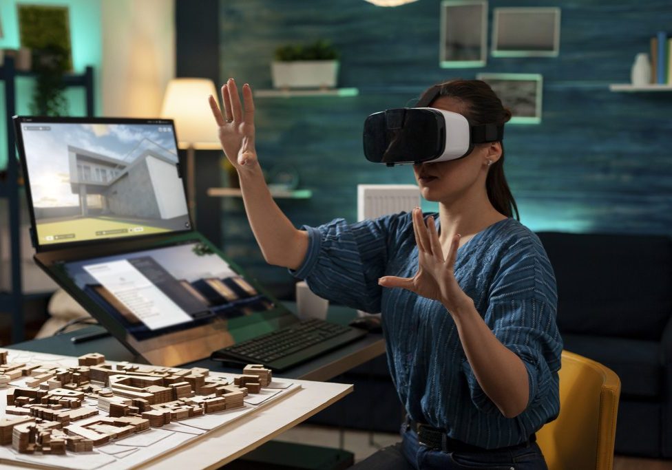 Amutri 3D visualisation in use - woman using VR headset for architectural design