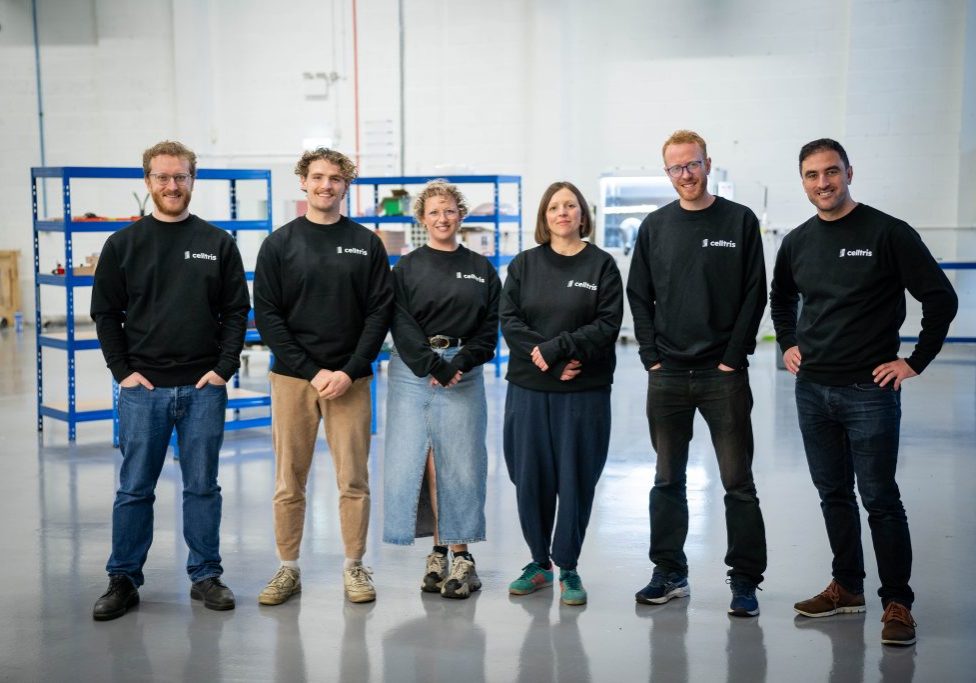 Celltris team - six people in manufacturing space smiling wearing black Celltris jumpers