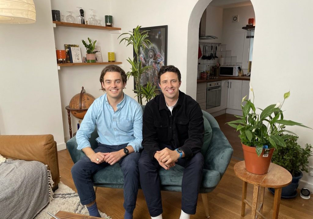 IMG_0304 spacebands founders smiling sitting on sofa in living room