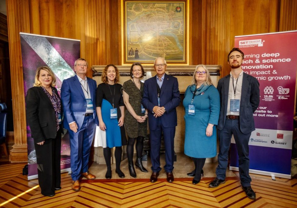 A group of government, university and industry leaders at the Economic Summit event