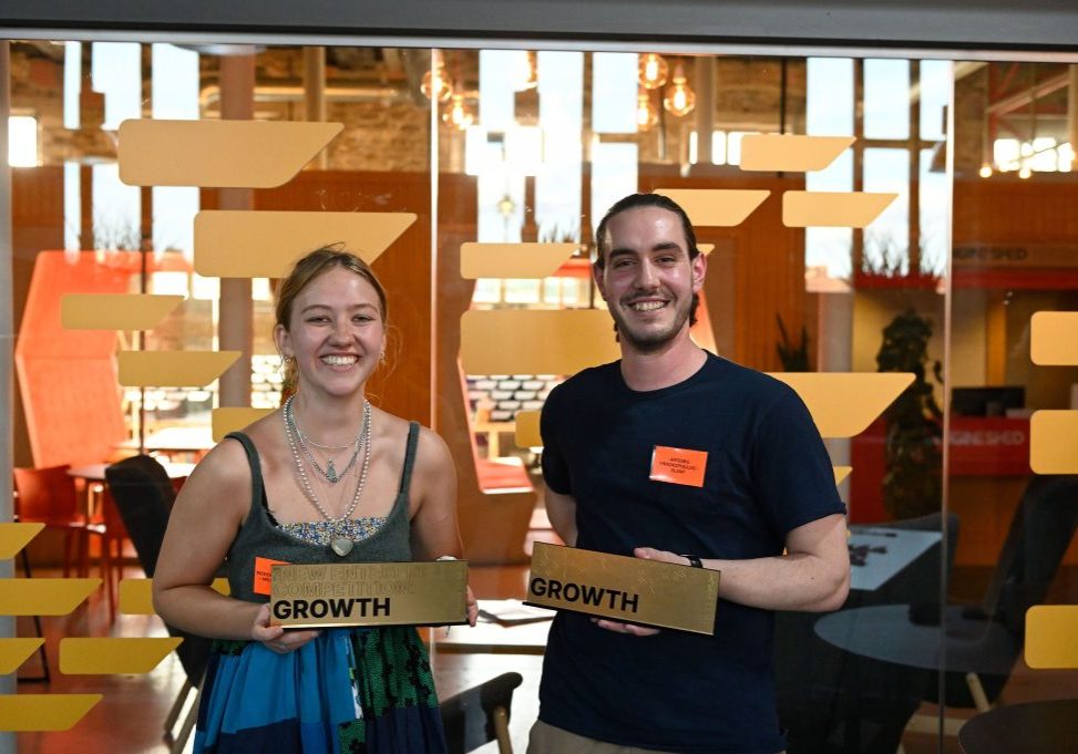 SLANT and Weaving Change founders with New Enterprise Competition award trophies