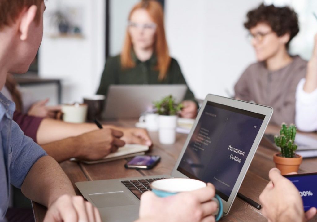 people in meeting - stock - cropped People in meeting - stock image